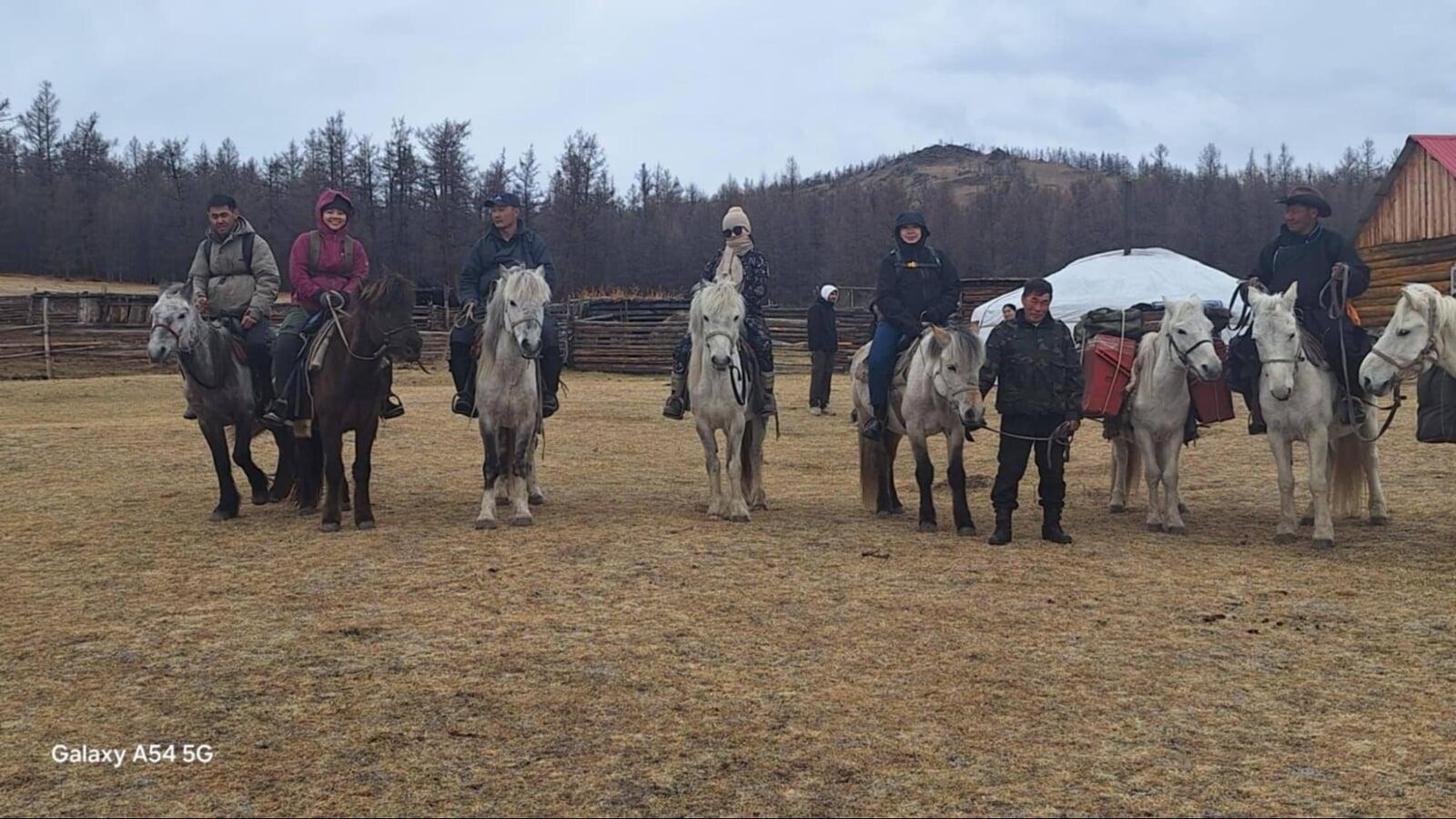 Visitors experience traditional horse riding while exploring nomadic life in Mongolia.