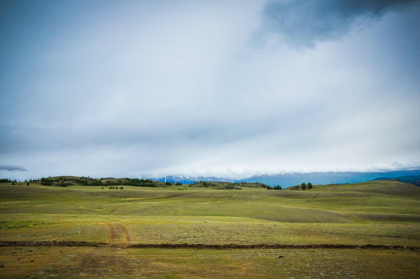 Mongolia open grassland with dirt tracks ideal for e-MTB tours and adventure cycling experience